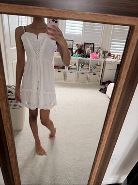 Francesca's Collections White Swiss Dot Lace-Up Mini Dress